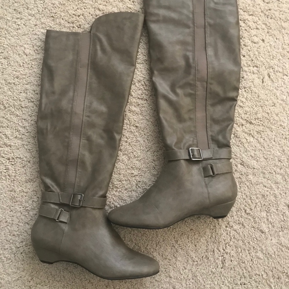 Thigh high heeled boots